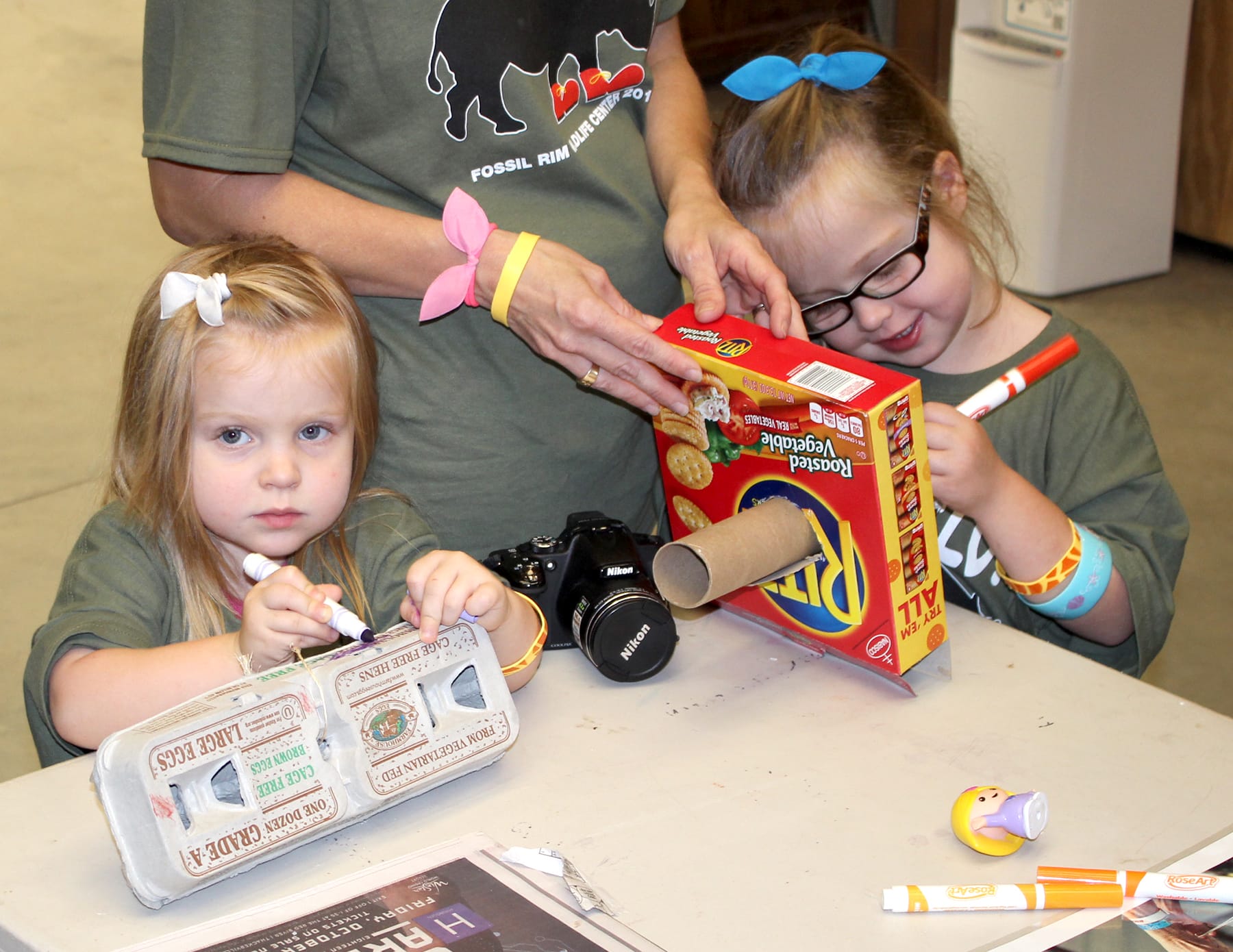 girls making toys